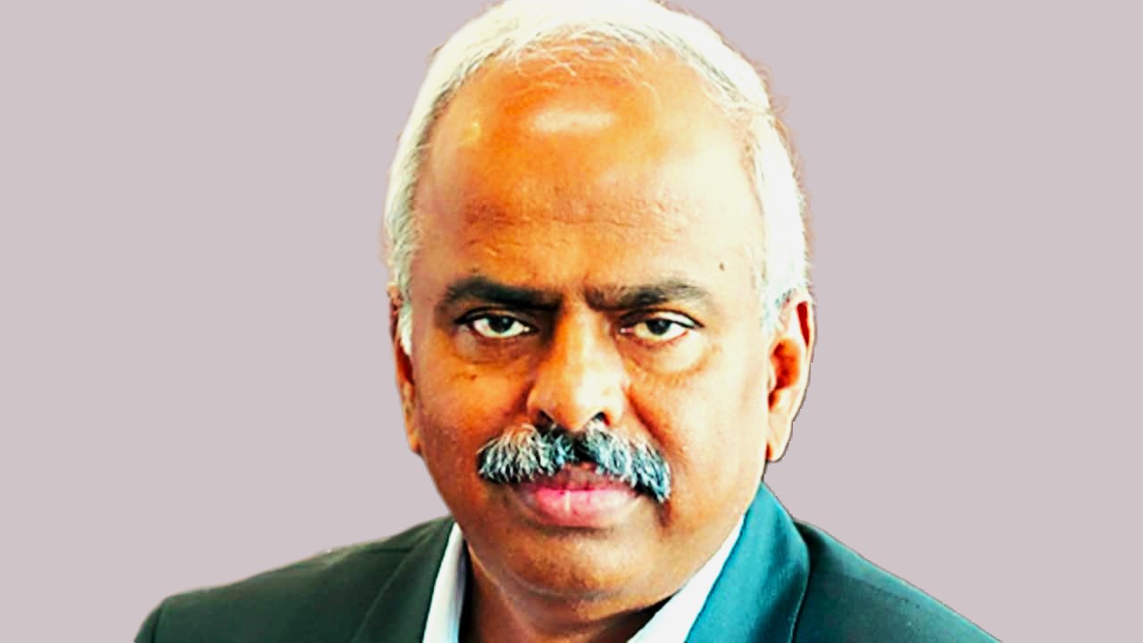 Dr. Velumani